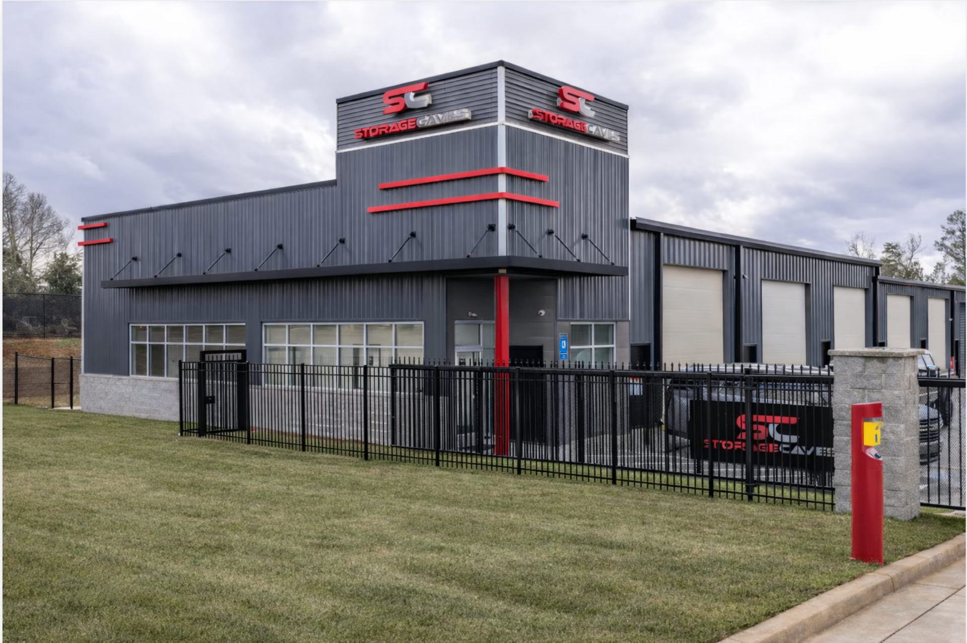 Storage Caves Buford facility entrance with branded signage and gated access